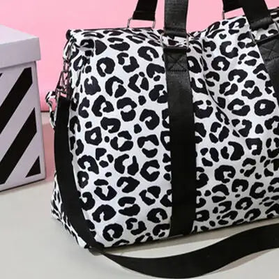 Adventurer’s Animal Print Travel Bag