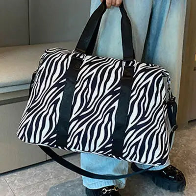 Adventurer’s Animal Print Travel Bag