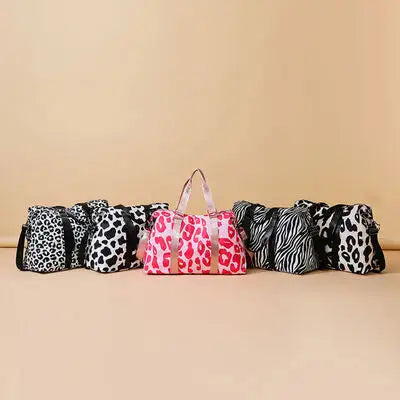 Adventurer’s Animal Print Travel Bag